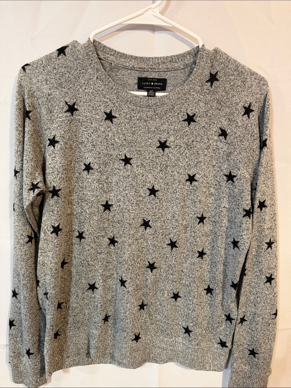 Lucky Brand women’s  Heather Grey Crewneck Sweater with Black Star Print